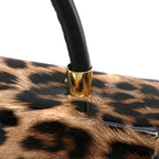 Leopard Print Saddle Handbag, Glossy Acrylic Shoulder Bag with Unique Curved Gold Handle, Women Trendy Crossbody Purse