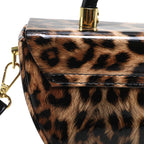 Leopard Print Saddle Handbag, Glossy Acrylic Shoulder Bag with Unique Curved Gold Handle, Women Trendy Crossbody Purse